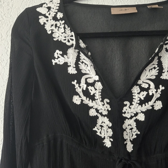 i.e. Small black silk Sheer tunic top with white embroidered V Neckline - Picture 7 of 8